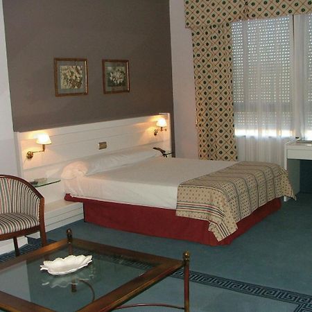 Hotel Las Cigueenas Трухильо Номер фото